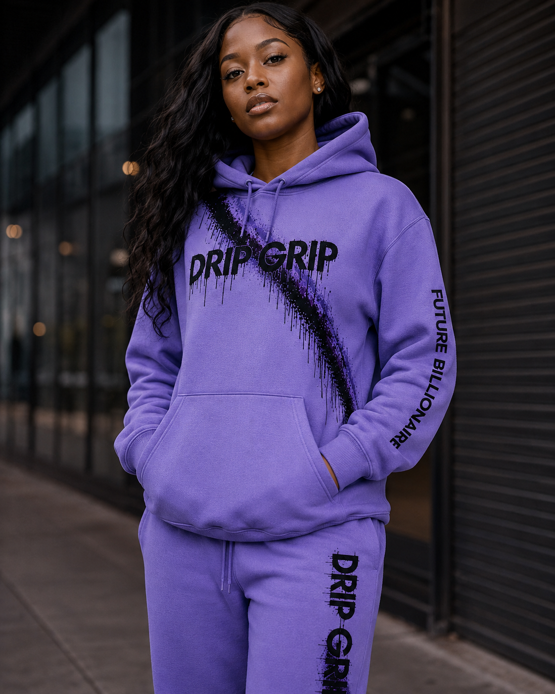 Female model wearing Drip Grip Future Billionaire tracksuit